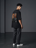 WOFF black oversized cotton-blend t-shirt with drop shoulders and graphic motorcycle print on the back