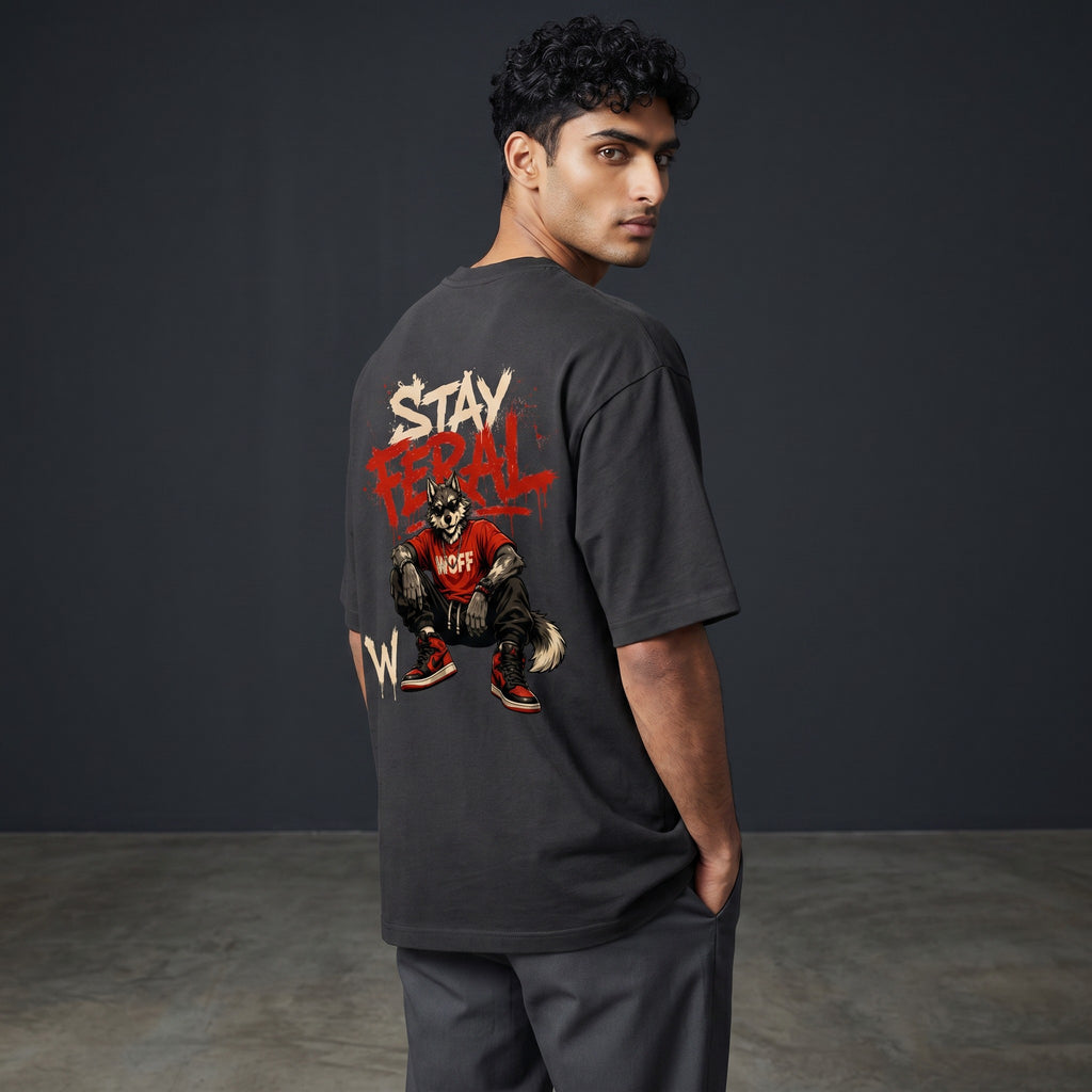 WOFF unisex oversized charcoal cotton t-shirt featuring a Stay Feral wolf graphic print on the back