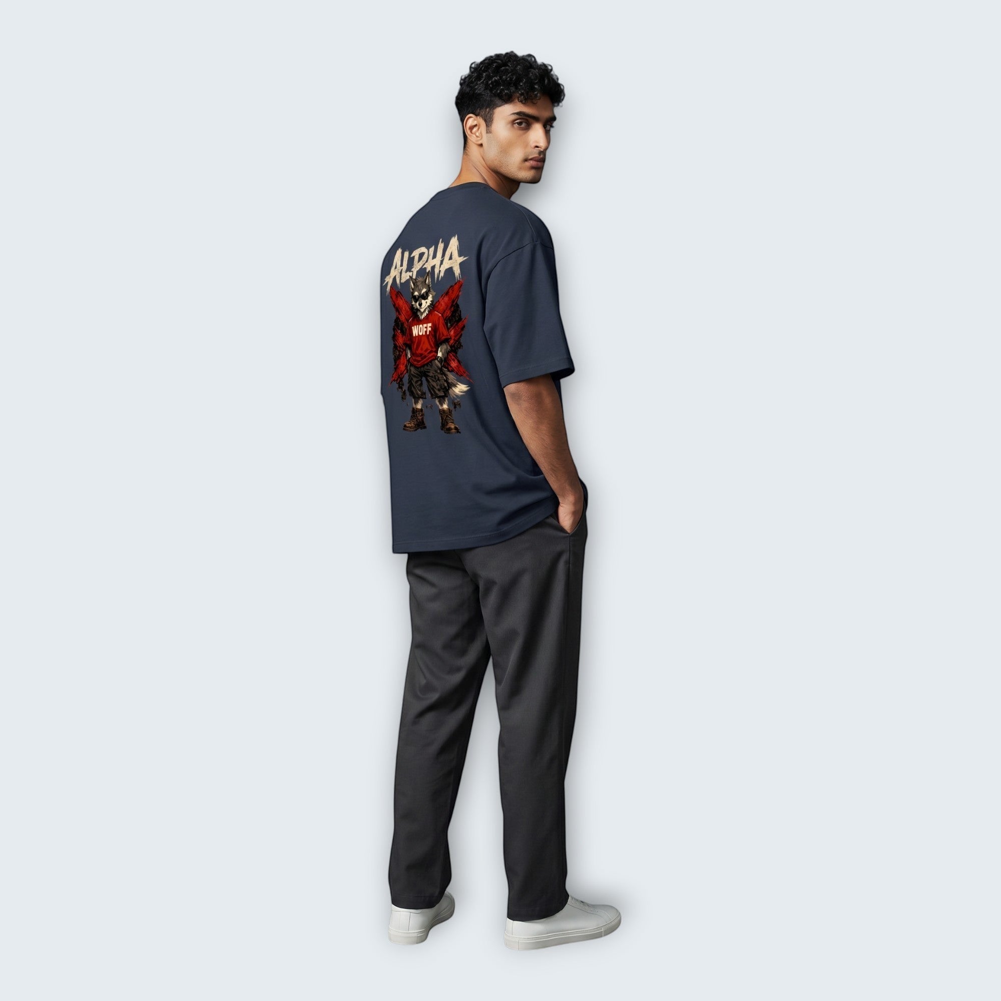 WOFF unisex oversized charcoal cotton t-shirt with Alpha wolf graphic print on back worn by a male model