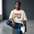WOFF unisex oversized terry tee in cream with Howl Y'all graphic, worn by a young person sitting on a stool.