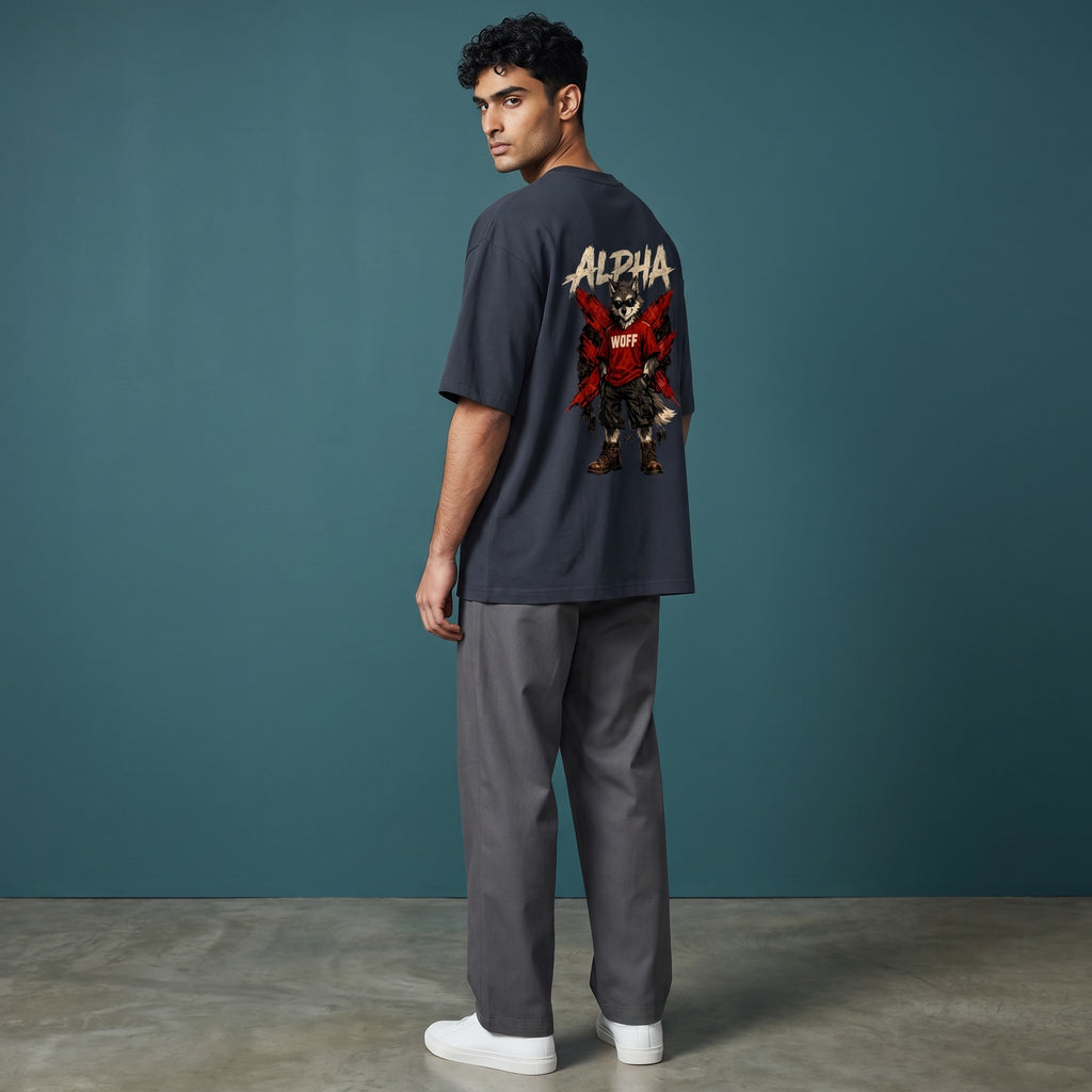 WOFF unisex oversized charcoal cotton t-shirt with Alpha wolf graphic print on back worn by a male model