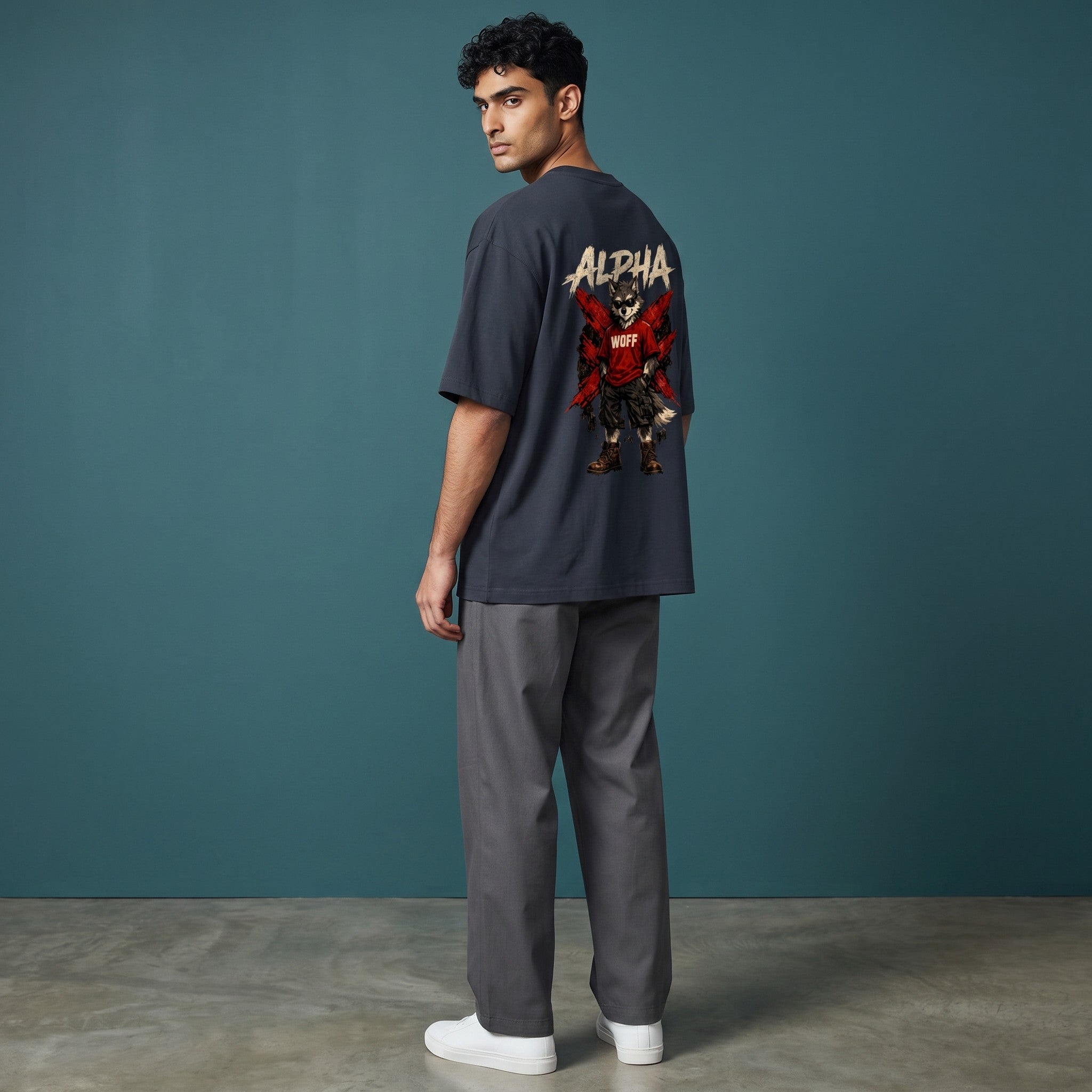 WOFF unisex oversized charcoal cotton t-shirt with Alpha wolf graphic print on back worn by a male model