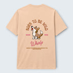 WOFF peach 100% cotton crew neck t-shirt with a graphic of a wolf howling and the text "BORN TO BE WILD" and "Whelp".