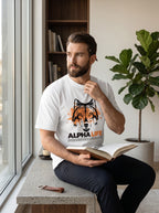 WOFF unisex white cotton crew neck t-shirt with a wolf graphic print, worn by a man reading by a window.